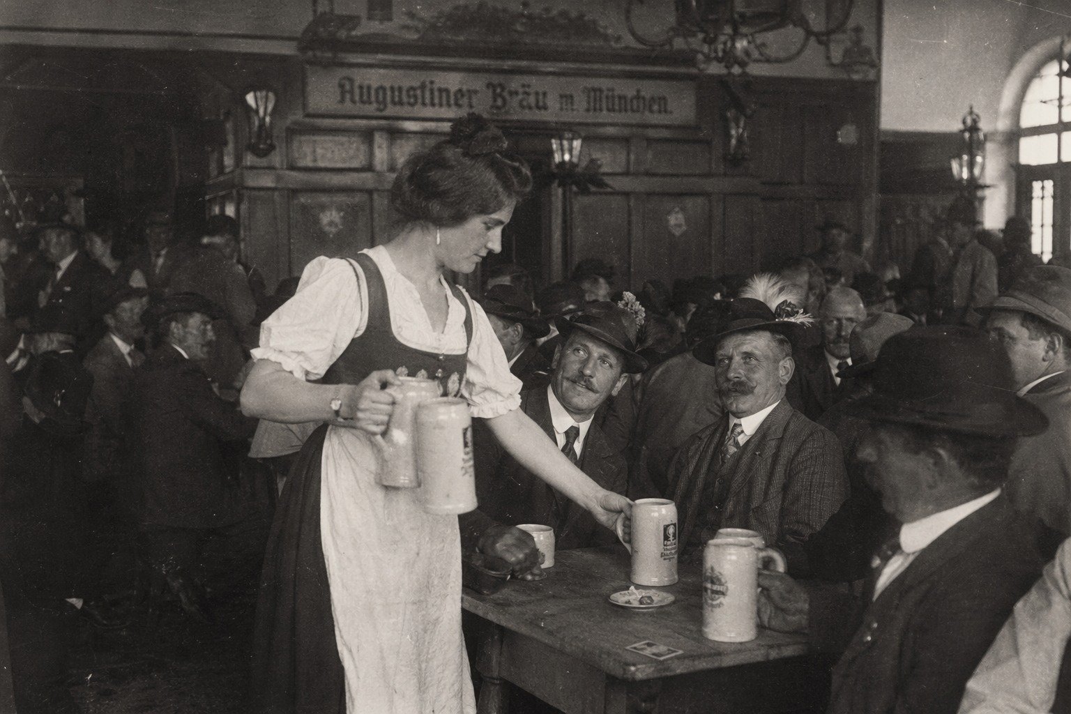 historical view how dirndl girl serve beer